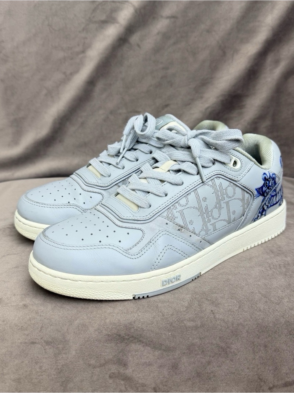 Dior Pale Blue Low-Top Sneakers with Blue Floral Heel Detail